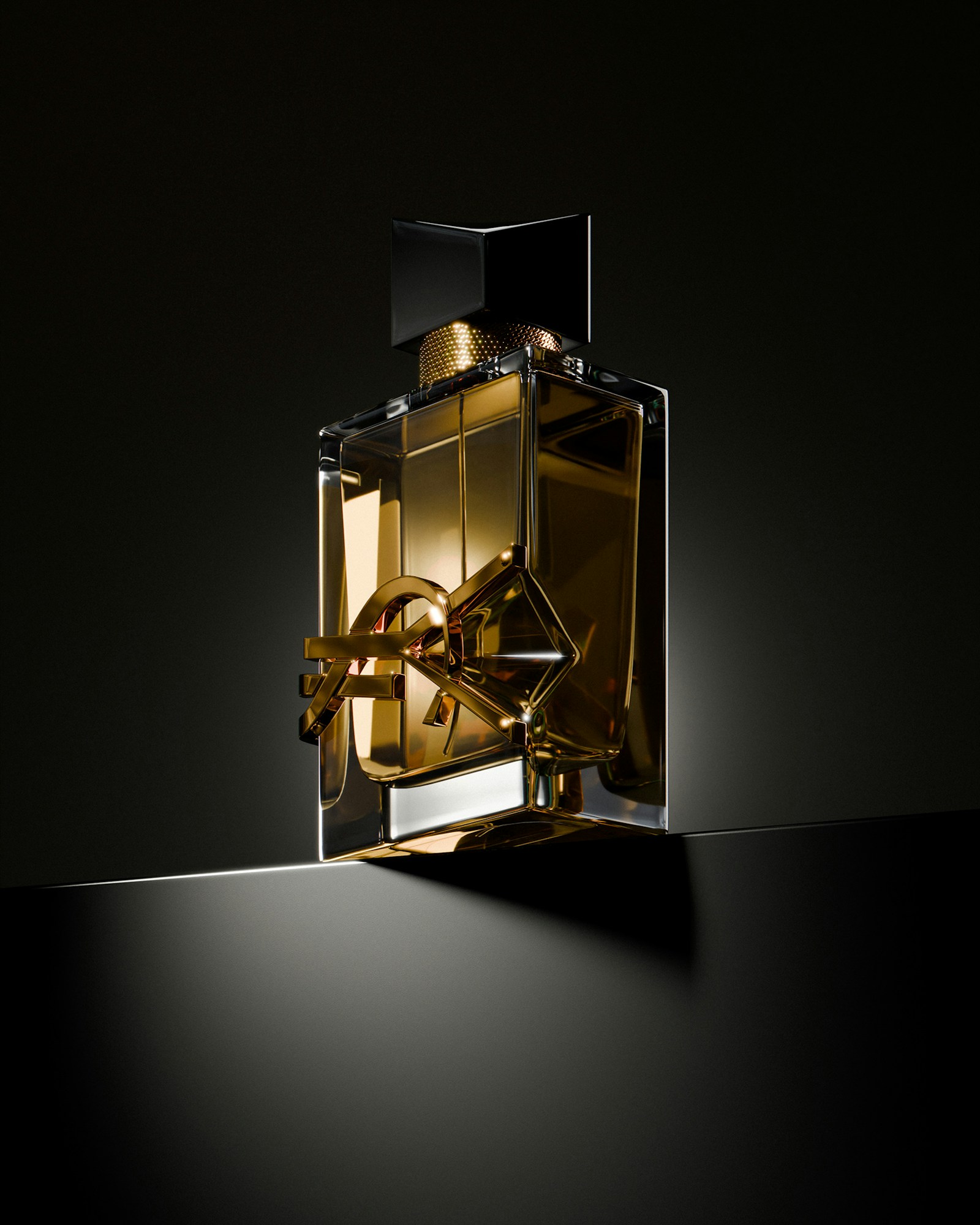 Dark amber perfume bottle in dramatic light